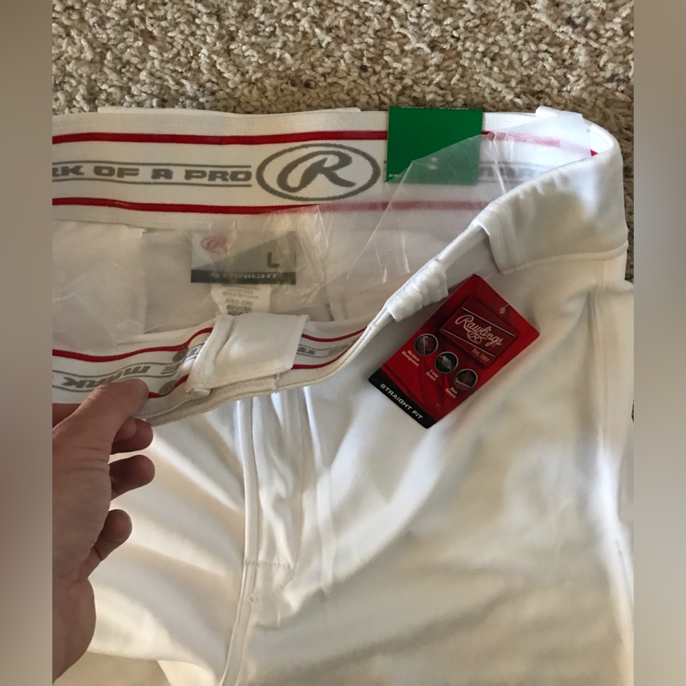 Large- NEW Rawlings pro style pants.